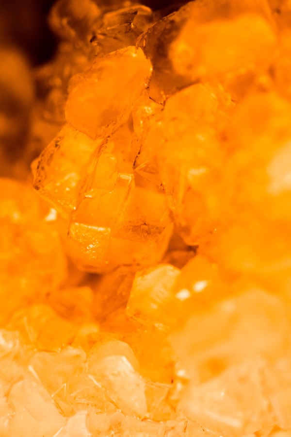 Yellow amber gemstones glowing in warm light